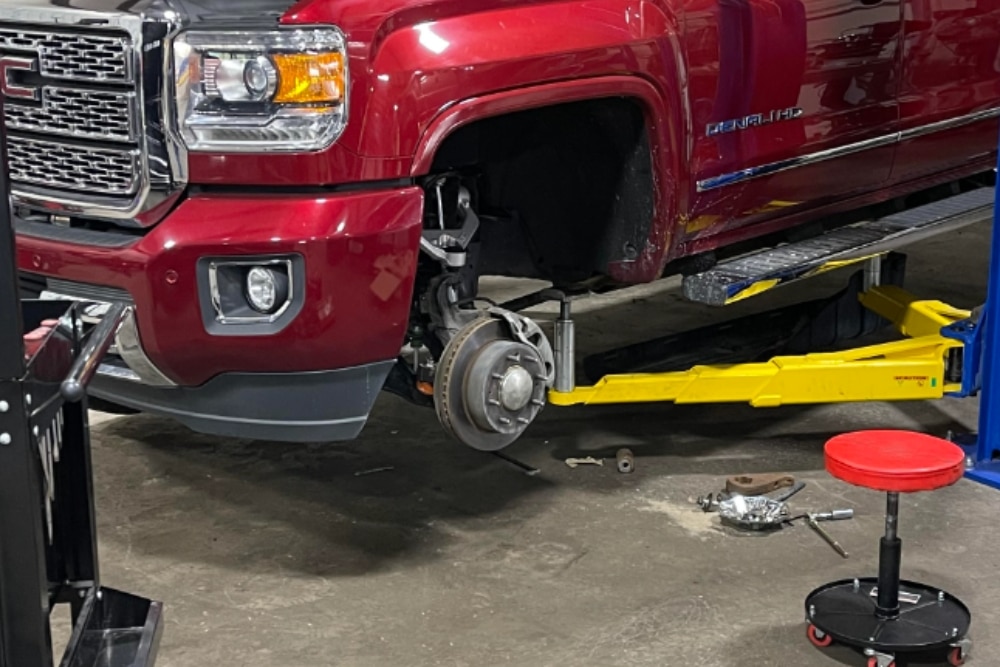 Winter Safety Inspection in Jamestown TN At Independent Auto and Diesel Repair. Vehicle undergoing brake repair