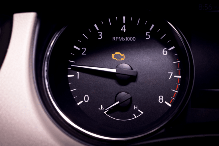 Check Engine Light, Vehicle Diagnostic in Jamestown, TN At Independent Auto and Diesel Repair. Close-up of a vehicle dashboard displaying a glowing check engine light,