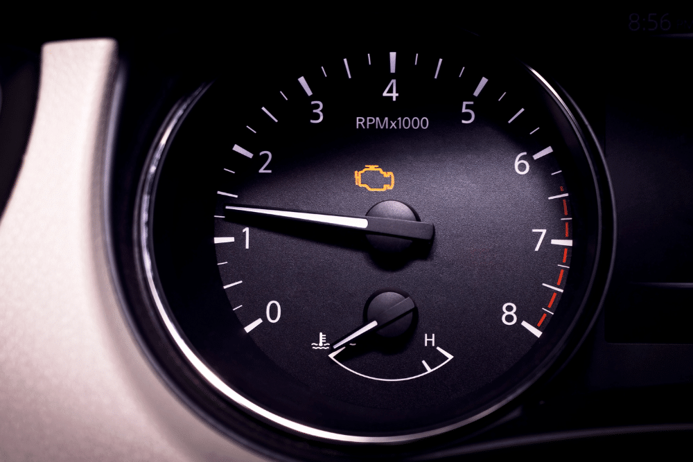 Check Engine Light, Vehicle Diagnostic in Jamestown, TN At Independent Auto and Diesel Repair. Close-up of a vehicle dashboard displaying a glowing check engine light,